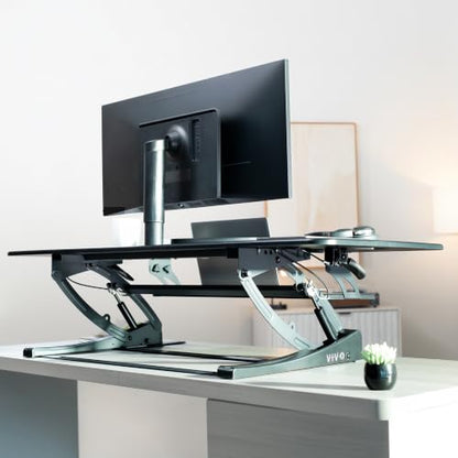 VIVO 54 inch Manual Height Adjustable Large Standing Desk Converter, Quick Sit-Stand Desk Riser, Tabletop Pneumatic Assist Height Adjust 6.5 to 17 inch, Black, DESK-V054V - color: Black, size: 54"