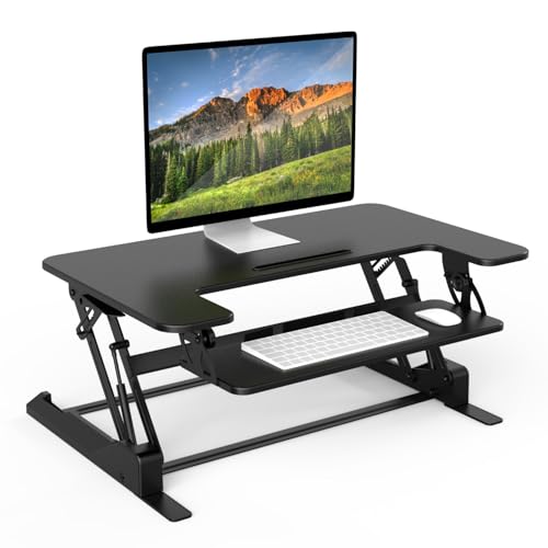 Mount-It! Standing Desk Converter - Height Adjustable Stand Up Desk with Gas Spring Riser - Wide 36 Inch Sit Stand Workstation Fits Dual Monitors – Black (MI-7926)