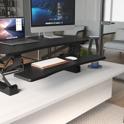 Mount-It! Standing Desk Converter 48" Wide Sit Stand Extra Large Desk Riser | Tabletop for 2 Monitors, Keyboard Tray & Device Slot, Height Adjustable from 6"–19.25" with Dual Gas Spring Handles, Black