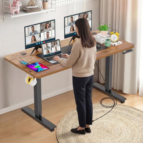 farexon 55 x 24inch Electric Standing Desk Adjustable Height with Power Outlets, Stand up Desk with Wheels,Outlets, Mouse Pad, Preset Heights Home Office Gaming Computer Workstations Table（Brown） - color: Brown, size: 55 x 24''-Outlets